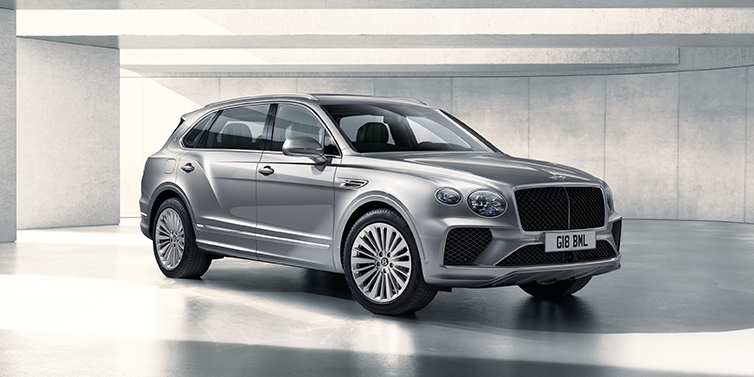 Bentley Perth Bentley Bentayga Extended Wheelbase SUV front three quarter in Moonbeam paint with a grey background