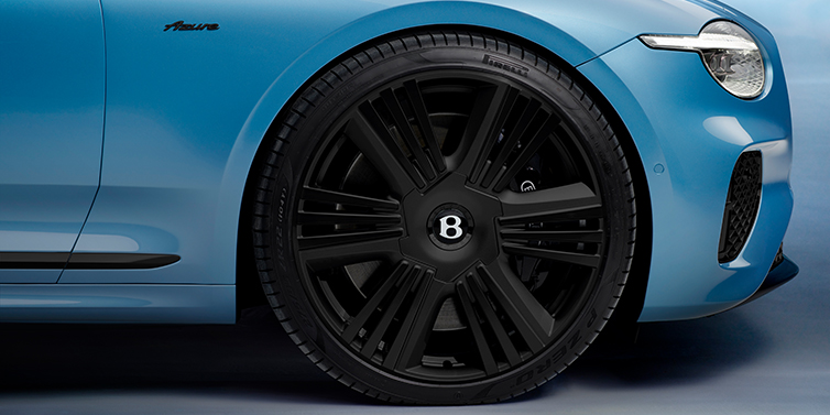 Bentley Perth New Bentley Continental GTC Azure convertible front wheel detail with 22 inch black ten spoke wheel and dark chrome details against Light Windsor blue paint