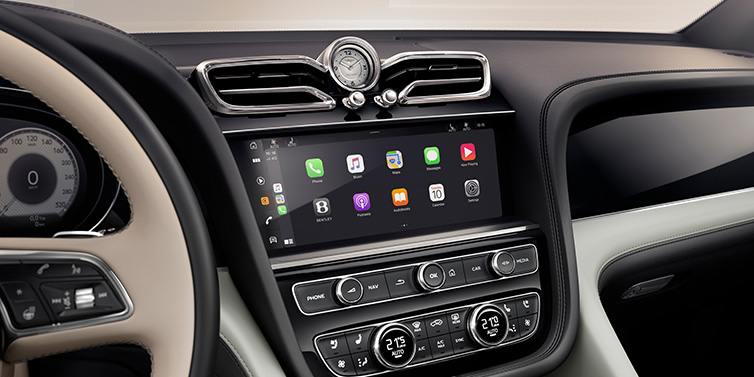 Bentley Perth Bentley Bentayga Extended Wheelbase Mulliner SUV front interior centre console with MMI screen showing Apps surrounded by Linen and Beluga black hide